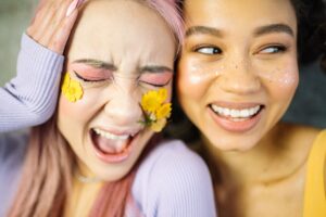 Smiling women showcasing a confident and healthy-looking smile.